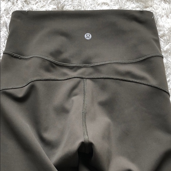 lululemon athletica Pants - NEVER WORN! lululemon In Movement 7/8 tight olive